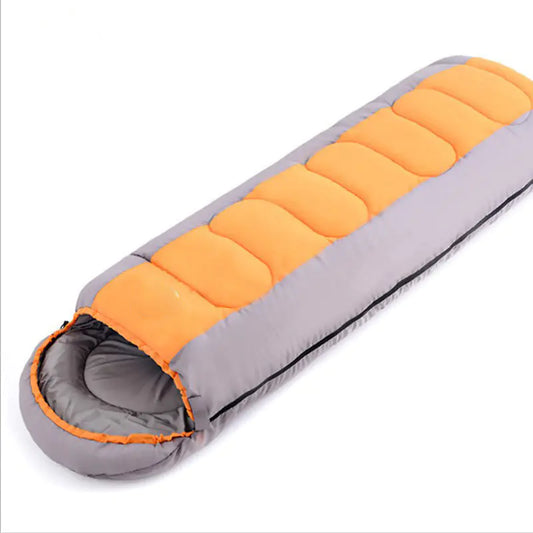 Orange and gray sleeping bag on a white background