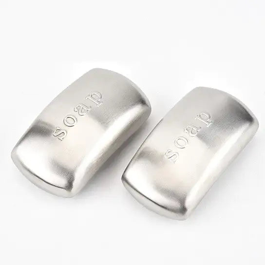 Silver stainless steel devices the size and shape of bar of soap called oder be gone that helps eliminate food prep oders as you 'wash' your hands while rubbing them like you would soap