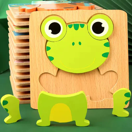 Wooden frog puzzle toy with green pieces on a green background