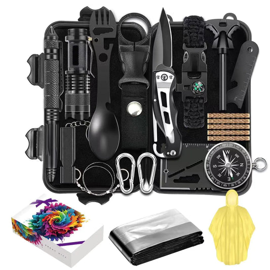 Collection of survival tools including a knife, flashlight, compass and more pictured with an open carrying case.