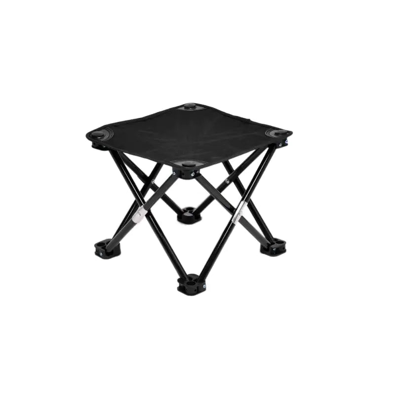 Black folding stool on a white background