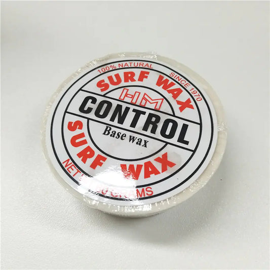 Surf wax container with 'HM Control' branding on a white background