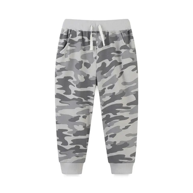 Camouflage-patterned jogger pants on a white background