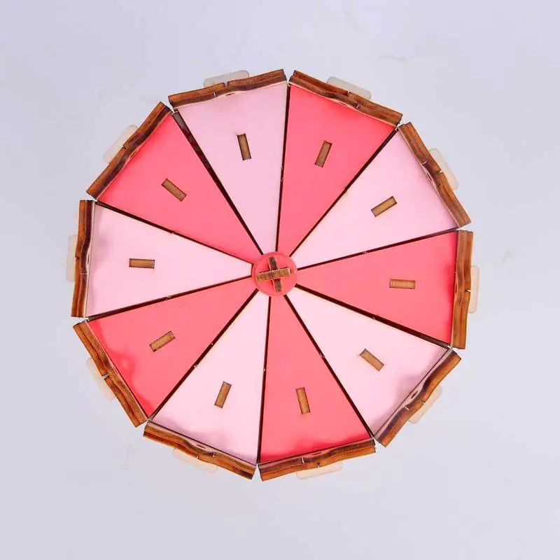 Top view of Pink carousel 3d puzzle kit with horses that runs on  AAA batteries once constructed