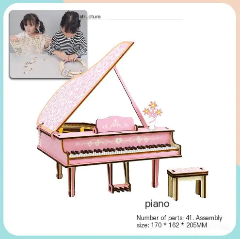 Wooden 3D puzzle that turns into Pink toy piano with a smaller inset showing assembly instructions.