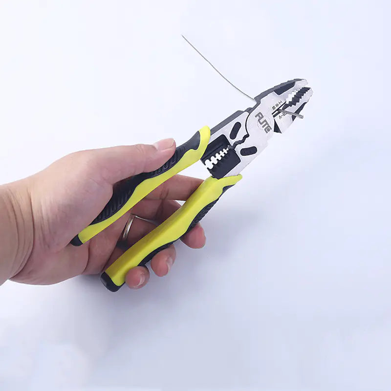 Hand holding a pair multi function pliers with a white background