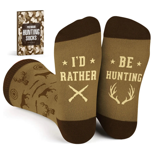 Mens Novelty Socks Huntings Socks Brown and the bottom of one foot says I'd Rather, and the mate says Be Hunting. all over design of deer, antlers, rifles and dogs, targets