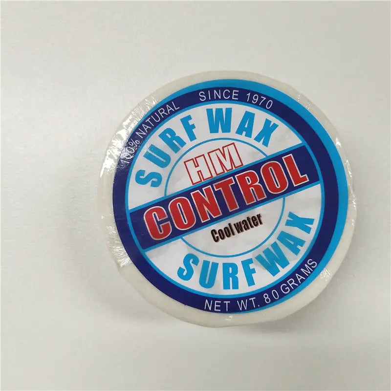 Surf wax container with blue and red label on a white background