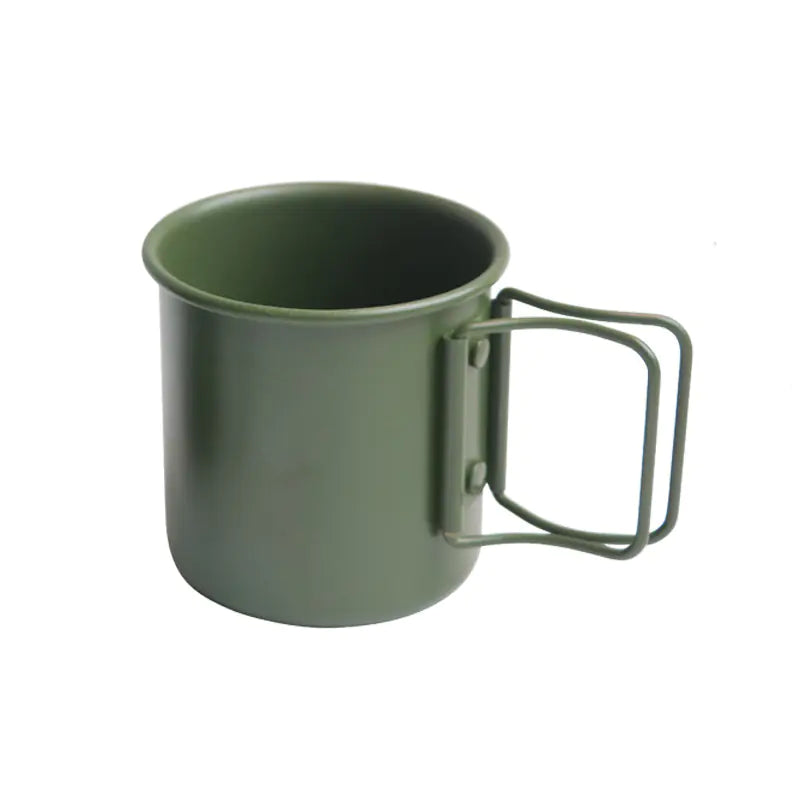 Green metal mug with handle on a white background