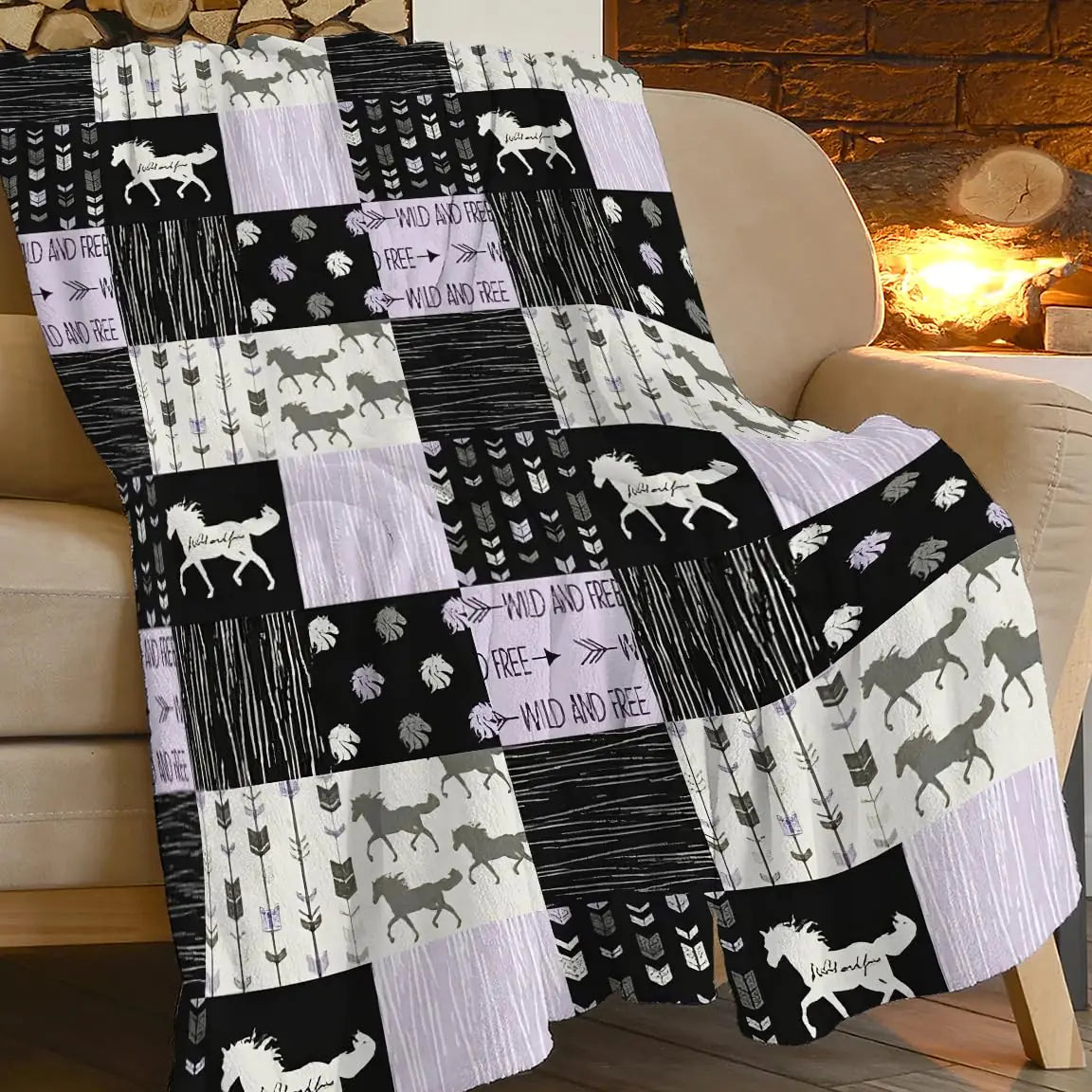 Patchwork blanket with horse designs draped over a chair in front of a fireplace.