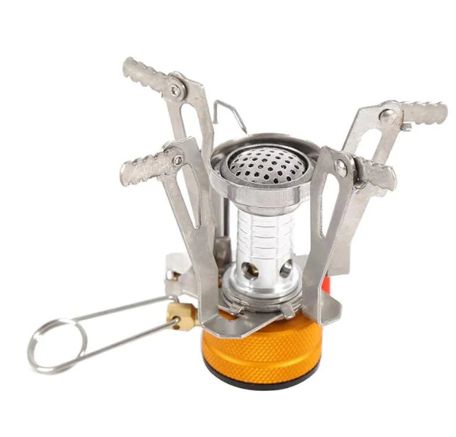 mini Portable camping stove with orange base on a white background