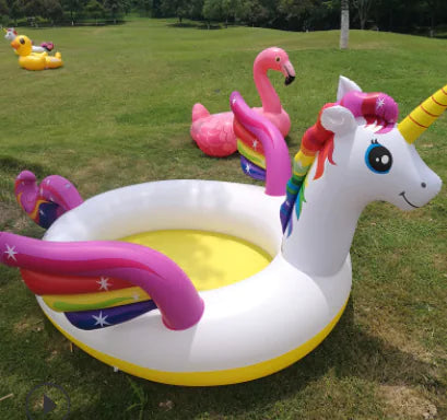 Unicorn-shaped inflatable pool on grass