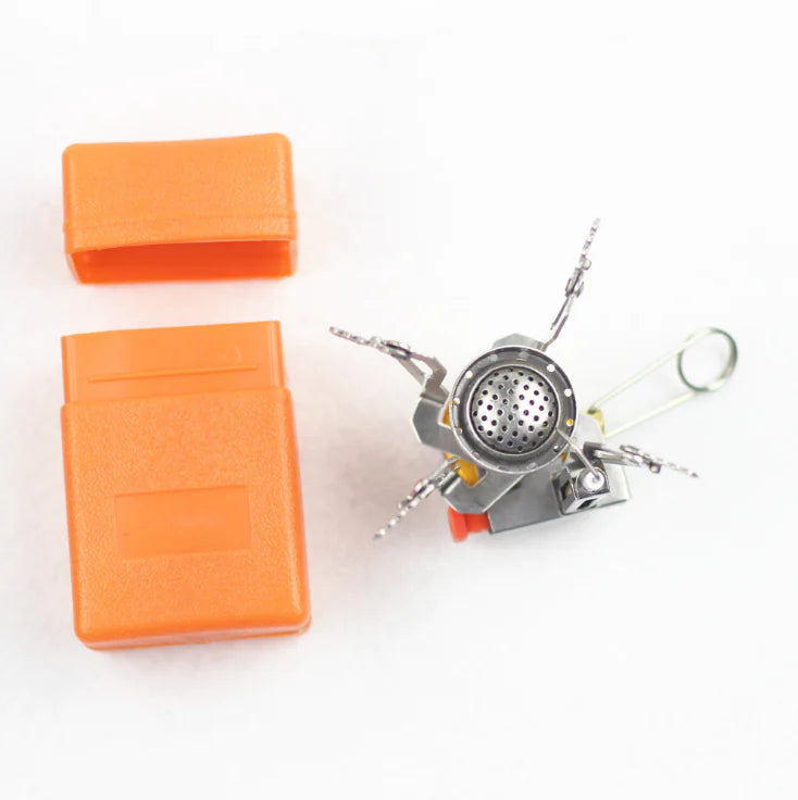 mini Portable stove with orange carrying case on a white background
