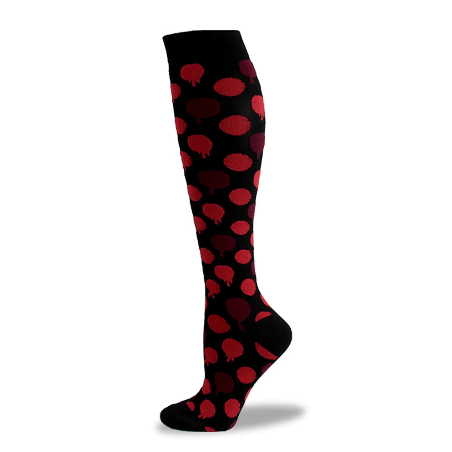 Black knee-high compression sock with red dot or blood drop pattern on a white background
