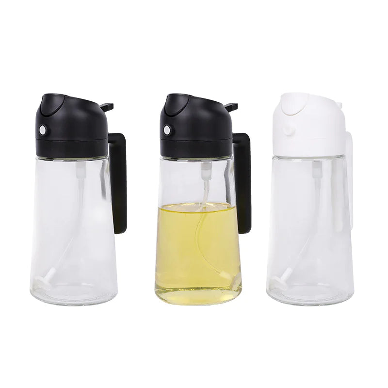 Three glass bottles with black and white lids on a white background