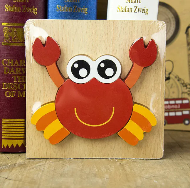 Wooden puzzle with a red crab design on a wooden surface with books in the background