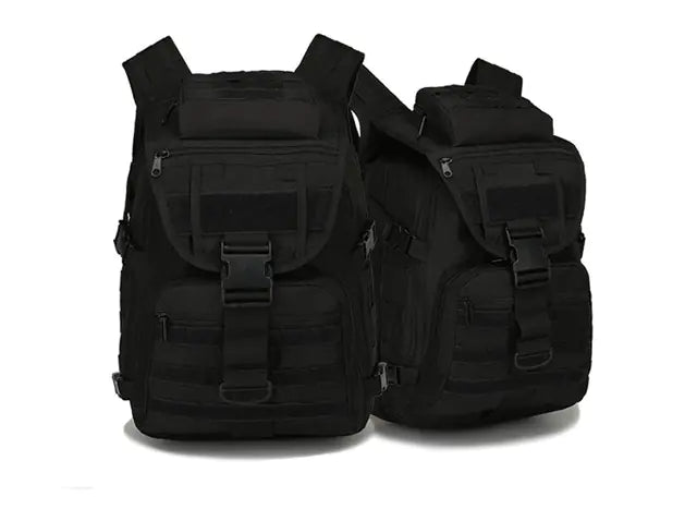 Two black tactical backpacks on a white background