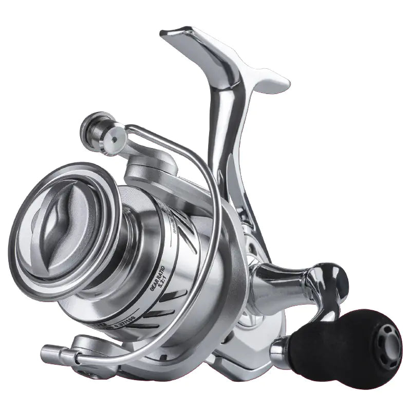 Silver fishing reel on a white background