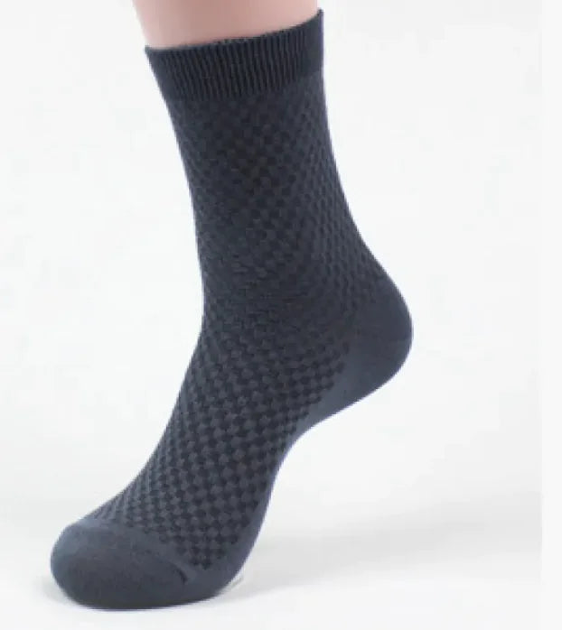 Dark gray textured bamboo sock on a white background
