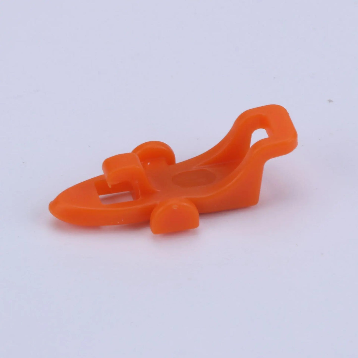 Orange plastic bait hanger for fishing pole on a white background