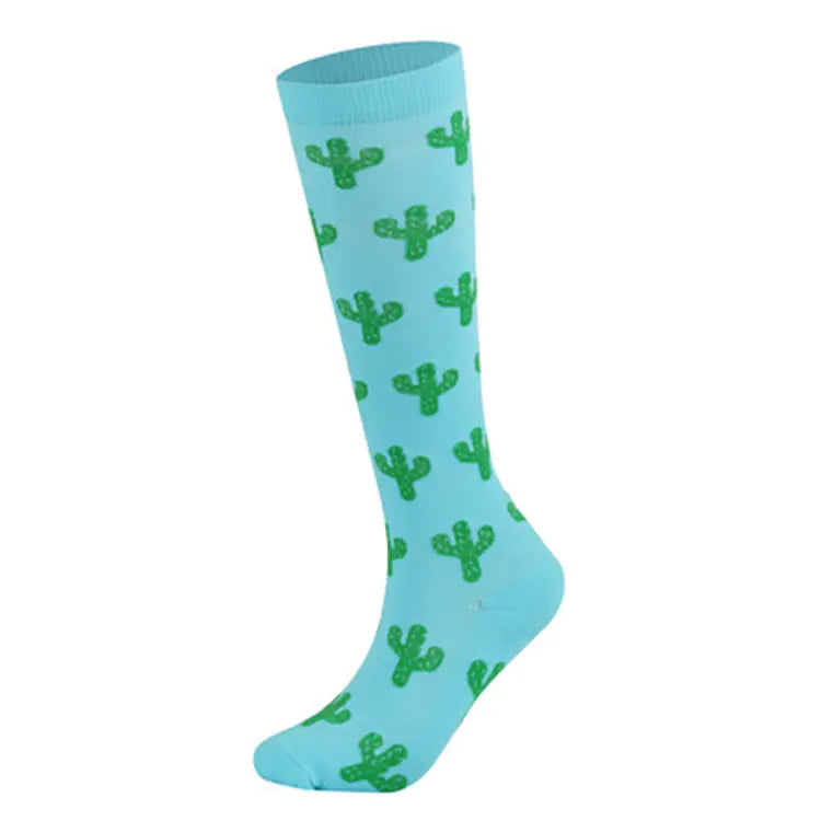 Light blue compression sock with green cactus patterns on a white background